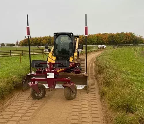 This image shows our full site survey in progress, with professional consultation ensuring precise groundwork for equestrian construction.